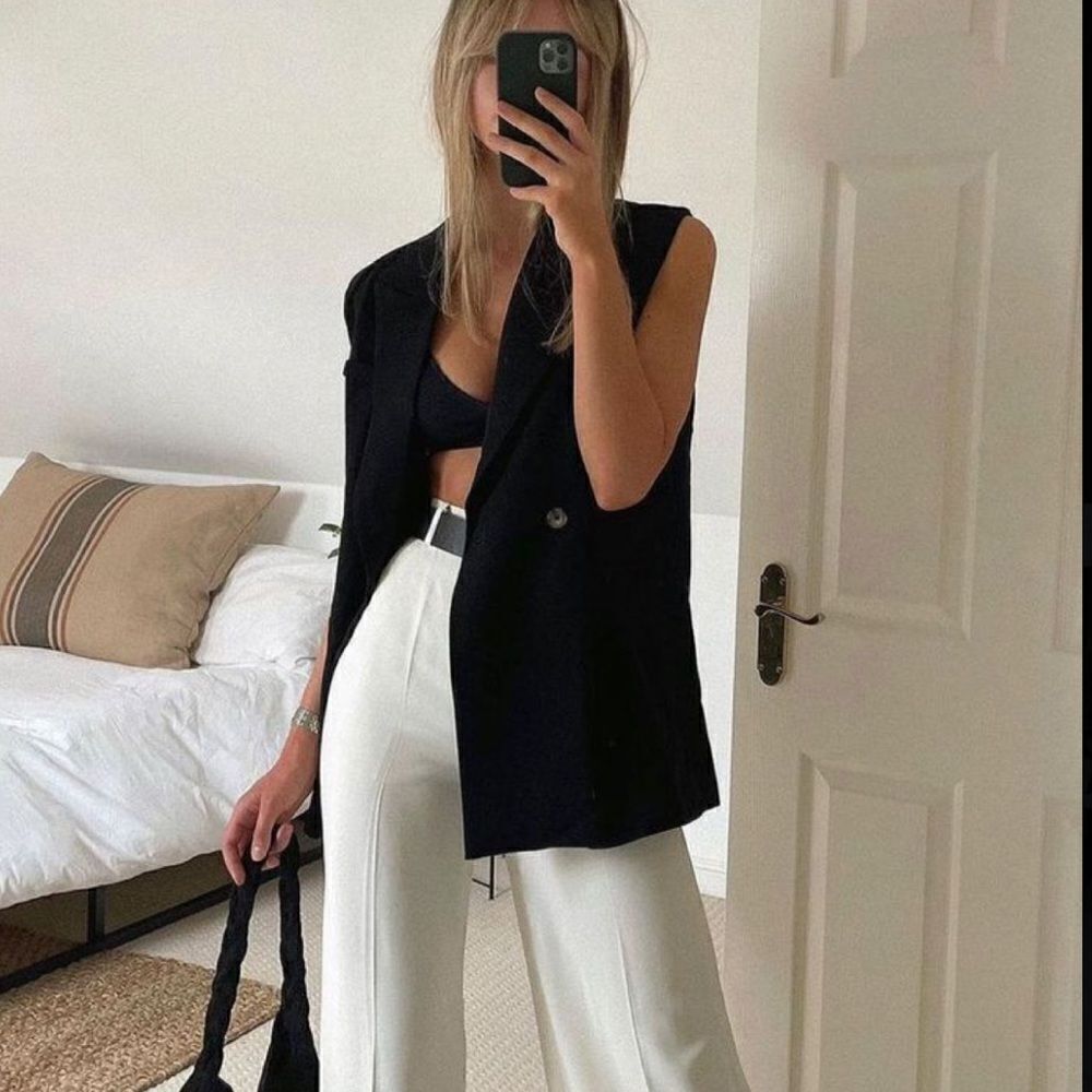 Black sleeveless blazer